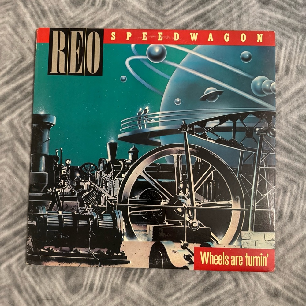 Vintage REO Speedwagon 'Wheels Are Turnin'' Vinyl Record